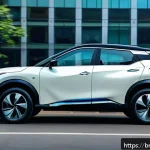 니산 아리아와 테슬라 모델 Y 비교 - A sleek Nissan Ariya electric SUV parked on a bustling city street in Bangladesh, showcasing its cla...
